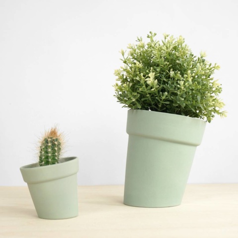 Small and large Distorted Flowerpots next to each other