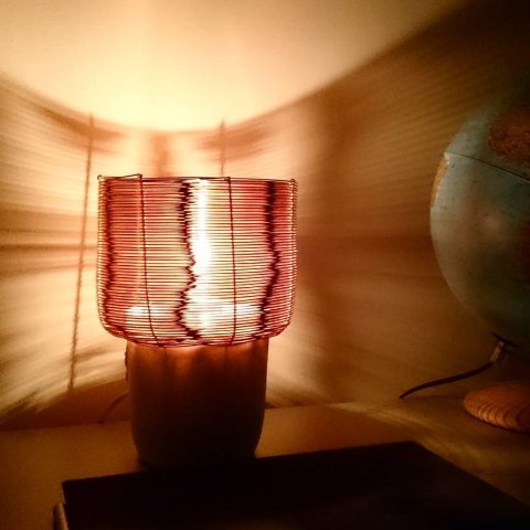 Quite surprised by the reflection of the our copper side lamp