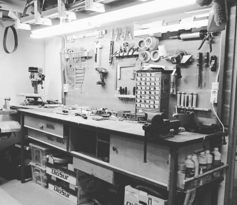 My favorite workbench in our workshop, where all the tools are ready to grab