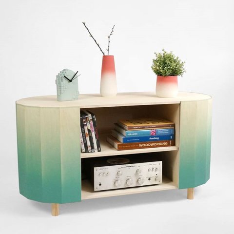 The result of our work-in-progress updates: the facet shelving. A versatile sideboard with facetted sides that function as doors