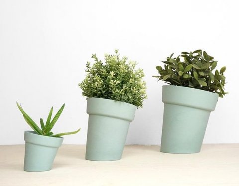 Distorted flowerpots in three sizes and three colors available.