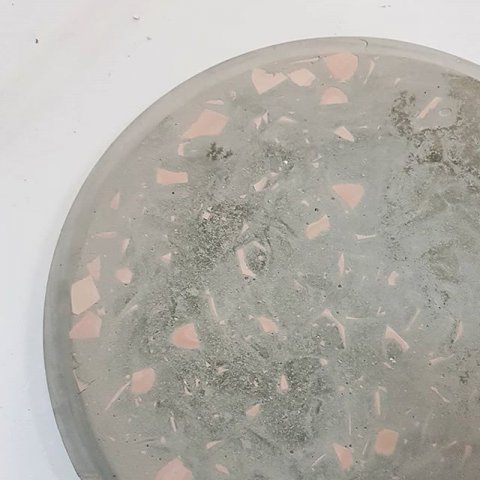 Concrete with mixed ceramic leftover shards...
Maybe more to come