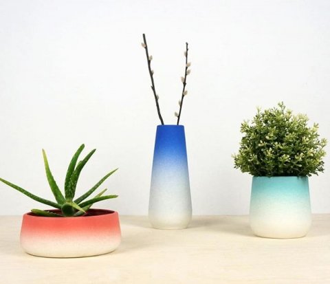 Flowerpots and vases with a gradient color. Available in 3 sizes.